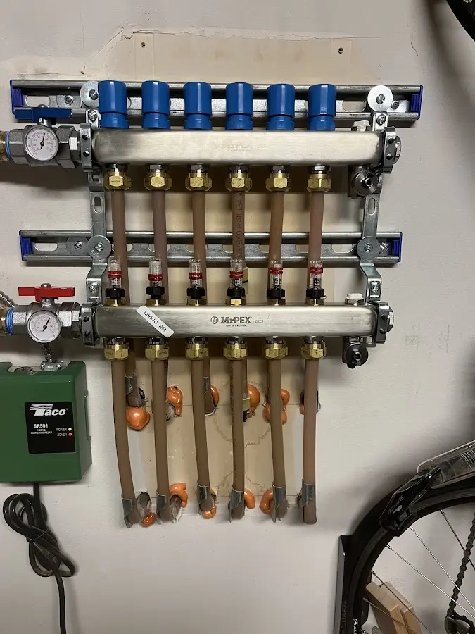 Plumber performing Water Heater Repair at a residential property in Fort Knox